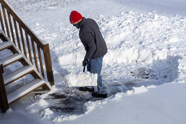 istock Unrecognizable adult man shoveling deep snow 2254410481