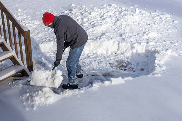 istock Unrecognizable adult man shoveling deep snow 2254410485