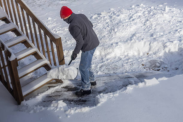 istock Unrecognizable adult man shoveling deep snow 2254410496