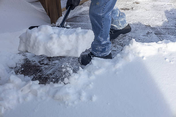 istock Unrecognizable adult man shoveling deep snow 2254410499