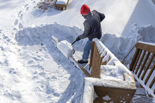 istock Unrecognizable adult man shoveling deep snow 2254410502