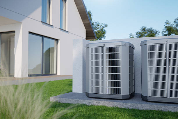 istock Air heat pumps beside house 2254411162
