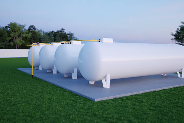 istock Large horizontal gas tanks at an industrial storage site, 3d illustration 2254411291