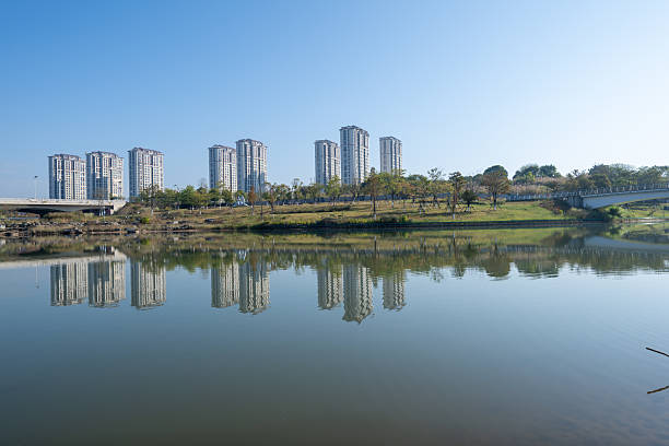 City residential buildings by the lakeside in the morning