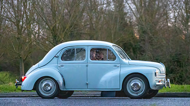 Milton Keynes,Bucks,UK - Jan 1st 2026:  1958 blue Renault 4 classic car driving on a British road