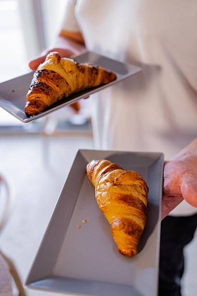 istock Fresh Croissants Served on Plates in Cafe 2254433499