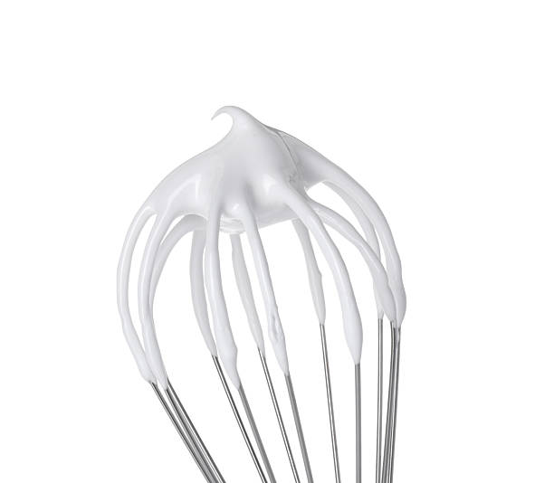istock Whisk with whipped cream isolated on white 2254435330
