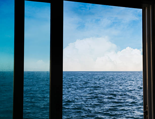 istock Blue sea with view window resort 2254436553