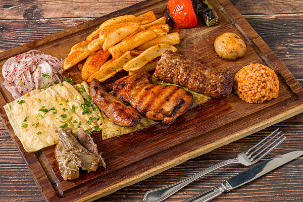 istock Traditional Turkish mixed grill platter served on wooden board 2254436933