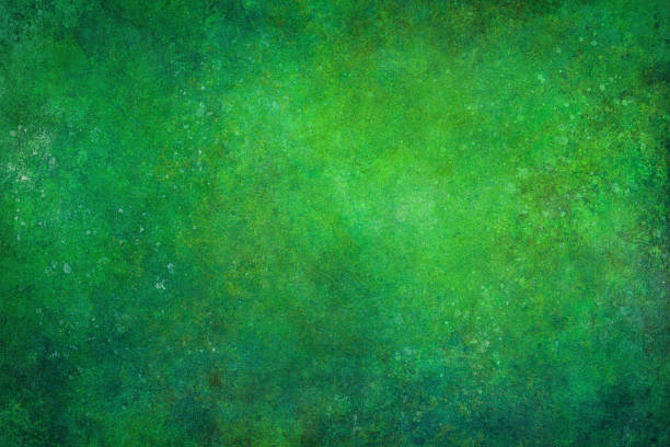 This atmospheric green grunge texture background offers a beautifully distressed aesthetic, perfect for creative design projects requiring an organic, vintage feel with weathered details. Mottled emerald tones and splattered patterns create a unique visual depth that enhances any artistic or professional composition.