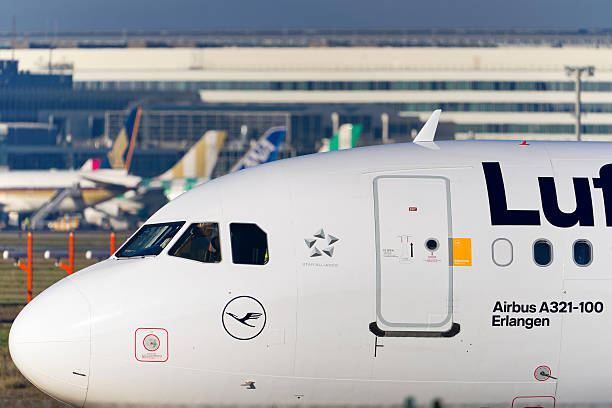 Lufthansa passenger airplane Airbus A321-100 registration D-AIRC pulled by aircraft tug at German Frankfurt Airport on a sunny autumn day. Photo taken November 22nd, 2025, Frankfurt am Main, Germany.