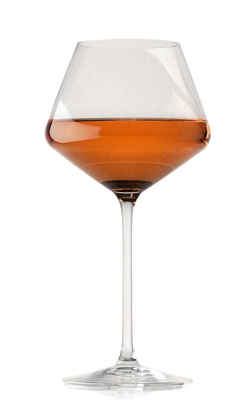 istock Rose wine in glass isolated on white 2254448852