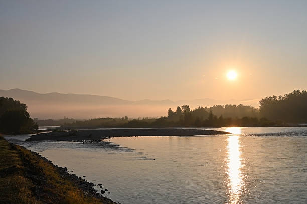 istock The morning sun rises over the river 2254452343