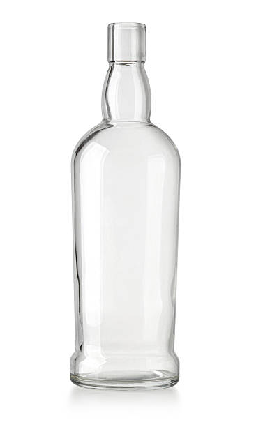 istock Clear glass empty liquor bottle on white background 2254453775