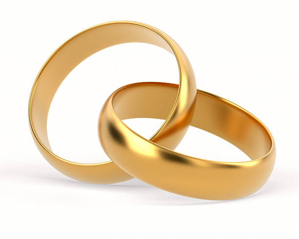 Two golden wedding rings on white background. Isolated 3D illustration