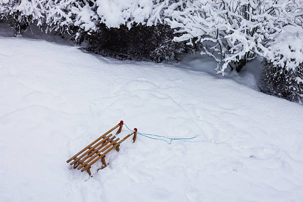 Snow, winter landscape, germany, January. Sled in snow.