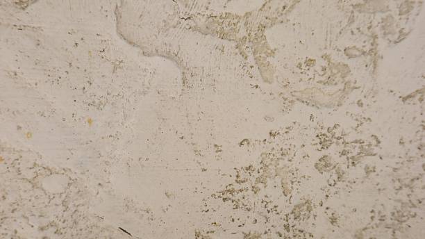 istock a close up view of a rustic plaster wall with a rough and textured finish 2254456175