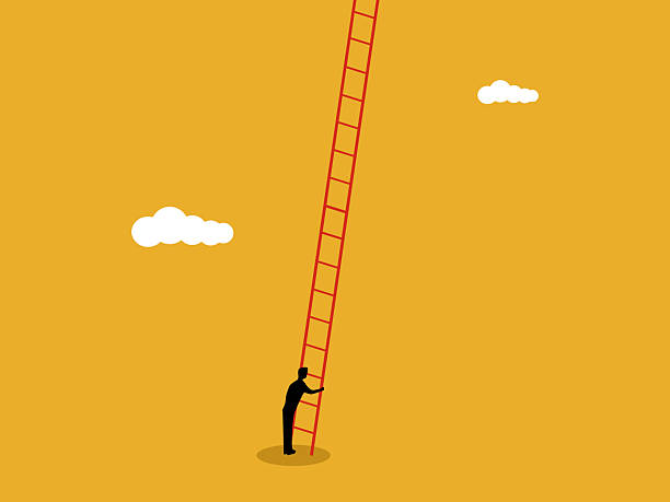 istock businessman try climb the ladder to the sky 2254457459