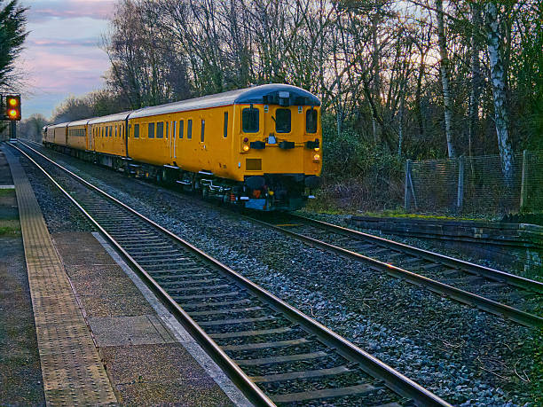 istock A diesel  locomotive is pulling a goods / freight train 2254457772