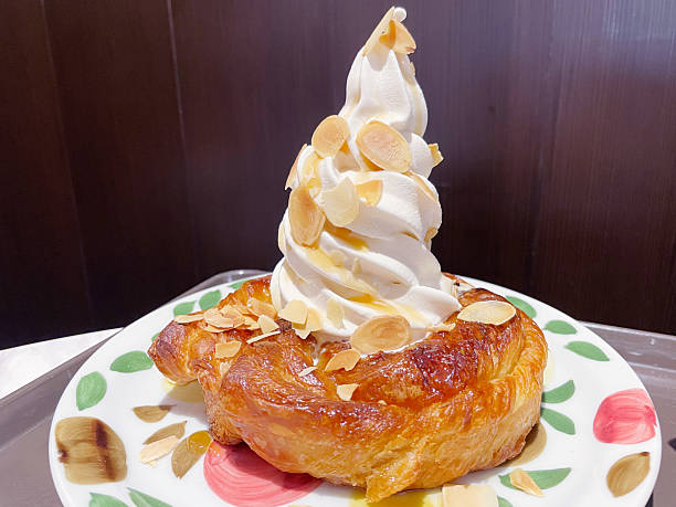 istock Danish pastry topped with soft serve ice cream 2254462055