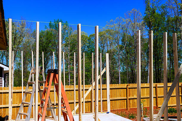 istock Construction of wooden framework in backyard for remodeling home 2254464379