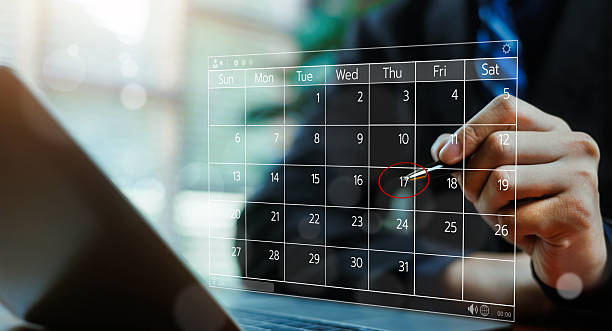 istock Business professional marking an important date on a digital calendar interface, representing planning, scheduling, deadline management, productivity, and modern corporate time management concepts. 2254464658