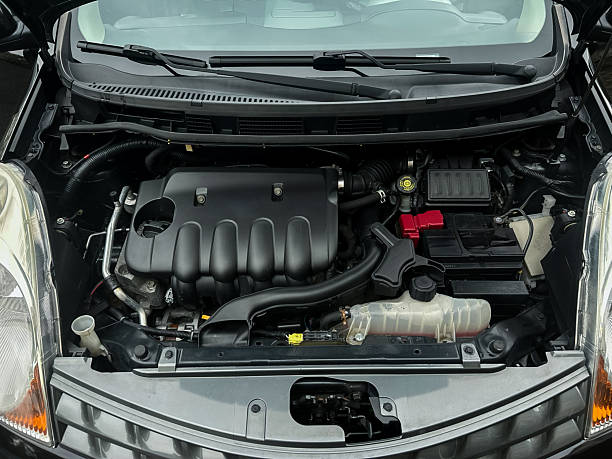 istock Engine bay of a modern compact car showcasing intricate machinery and components during a routine check on a sunny afternoon 2254465139