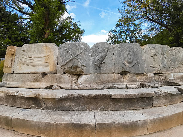 Tourist couple looking at a historical landmark antique roman city