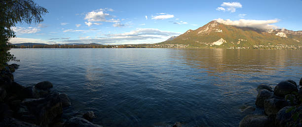 Tranquil scene on the lake with Autumn forest in the background, Haute-Savoie