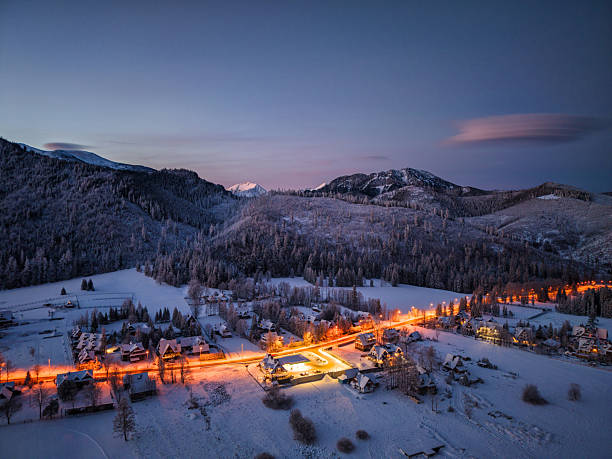 istock Moonlit Mountain Village at Dusk 2254481157