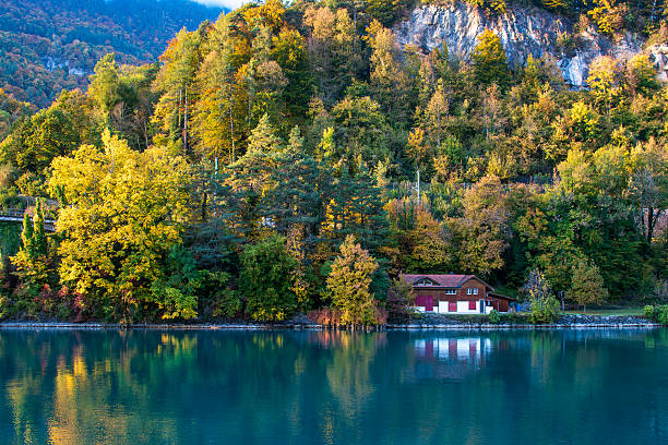 Interlaken, Switzerland - Oct 14, 2025. Beautiful autumn lake scenery in Interlaken, Switzerland.
