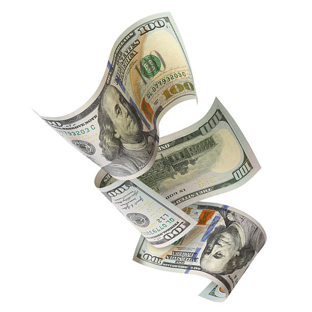 istock Flying hundred dollar banknotes, isolated on white background 2254481465