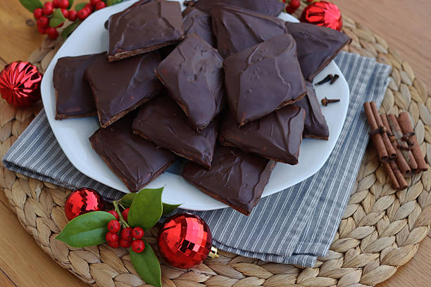 istock Italian  cookies called Mostaccioli or Mustaccioli on a plate on  table with Christmas decorations 2254482239