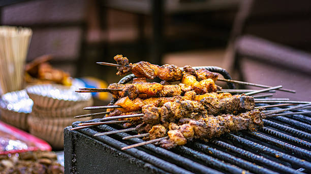 istock Kebabs being grilled on barbeque skewers. 2254484402