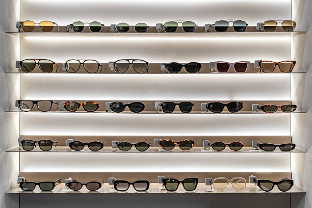 istock Modern Optical Store Interior with Illuminated Shelves, Sunglasses and Eyeglasses Display, Minimal Contemporary Eyewear Retail Showcase and Vision Care Concept 2254490149