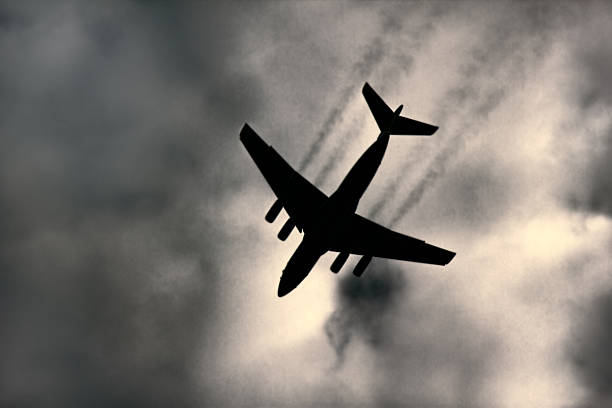istock Jet plane on background of cloudy sky 2254493654