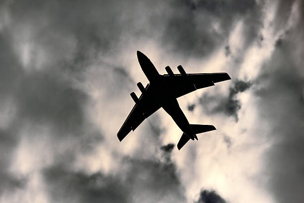 istock Jet plane on background of cloudy sky 2254493658