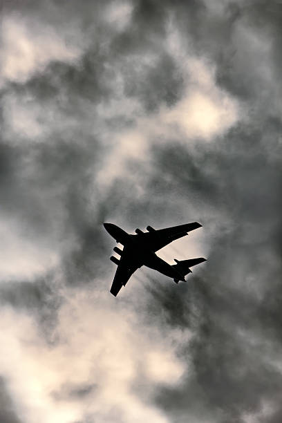 istock Jet plane on background of cloudy sky 2254493742