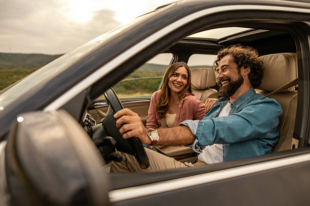 istock Couple enjoying road trip together during sunset 2254495068