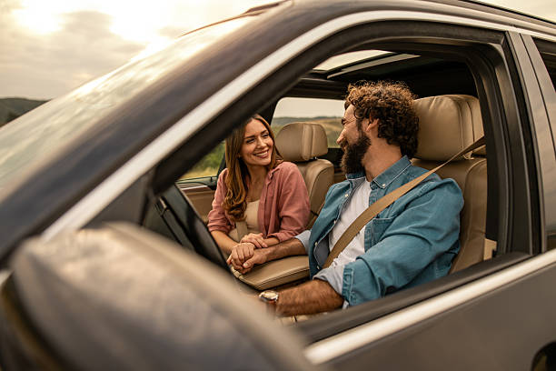 istock Young couple enjoying road trip together holding hands 2254496204