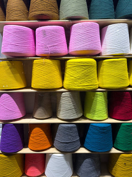 istock Colorful Spools Of Thread On Shelves In A Craft Store Display 2254500466