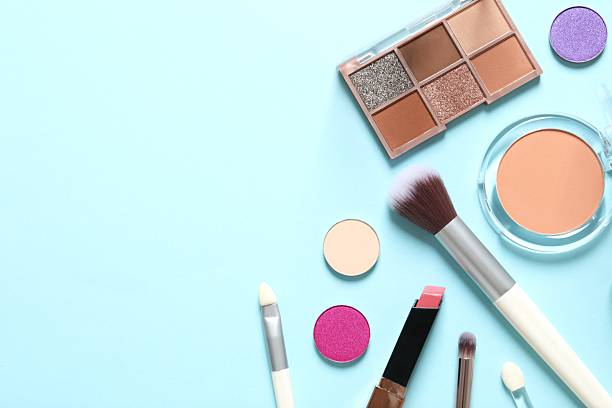 Professional decorative cosmetics, make-up products and accessories on color background, minimal style. Beauty, fashion, visage and shopping blogger concept