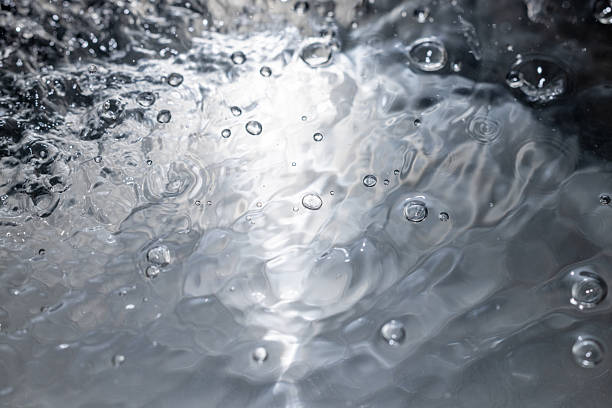 Chrome metal background, shiny and lustrous metal pattern texture, silky liquid chrome waves, 3D render illustration.