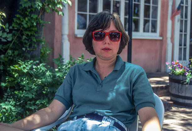 istock Albuquerque - Young Woman Rests on a Patio - 1990 2254501923