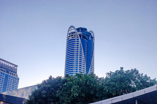 Hotels and skyscrapers behind R Walk in Bangkok downtown. View from Ratchadamri Road at late afternoon light. Behind  buildings is Phetchaburi Road.