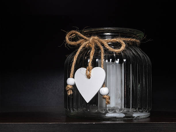 Valentine's Day motif, plenty of dark background, and a photo with a warm, welcoming atmosphere. Flash.