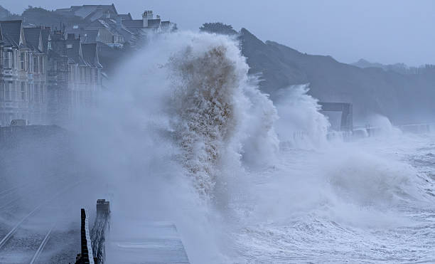 istock Huge breaking waves against Dawlish sea wall in a storm 2254508214