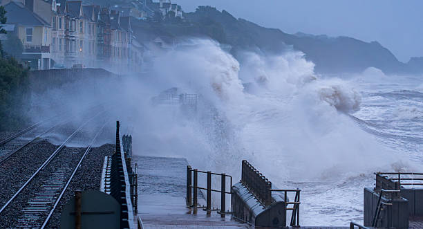 During a storm with southerly winds the sea gets rough and around high tide these conditions occur