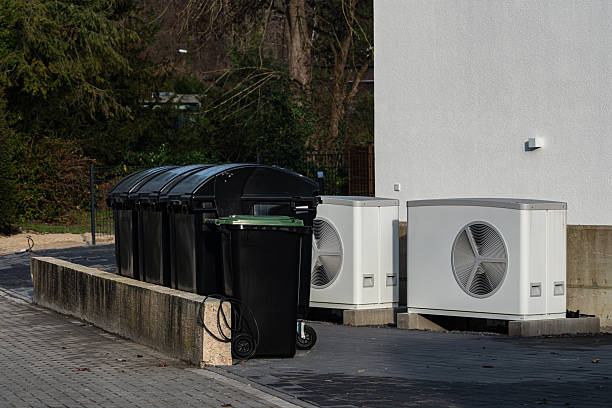 istock Trash bins and air conditioning units in urban setting 2254509616