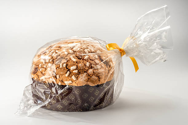 istock Panettone Christmas cake covered with sugar icing and almonds 2254513193